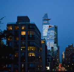Clear night in New York City with a great view from High Line to the Edge building and Hudson Yards area.