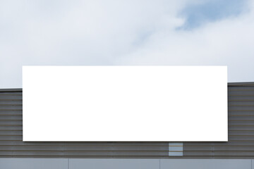 Blank white big mockup advertising sign on store, shop, shopping mall building. Empty banner mock up template outdoors