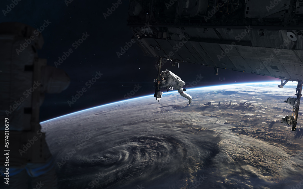 Wall mural space station in orbit of planet earth. solar system. science fiction. elements of this image furnis