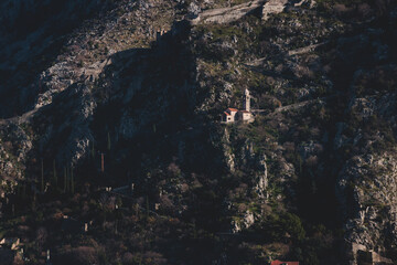 Church of Our Lady of Remedy in Kotor, Montenegro, beautiful top panoramic view of Kotor city old medieval town seen from San Giovanni St. John Fortress, with Adriatic sea, bay of Kotor and mountains
