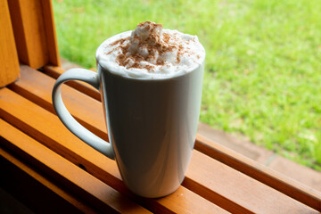 Breakfast with an autumn feeling, sunny morning and whipped cream with cinnamon to sweeten the day.