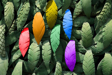 Flag of the lgtb community.Recycled tires, green leaf texture, recycled tires with the rainbow colors, climate change, conservation of natural resources. dying planet, earth day, graphic resource © Harold