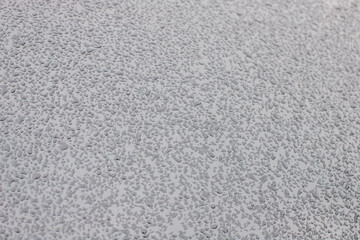 Fototapeta premium Raindrops background on black metal