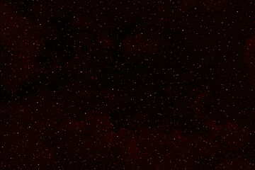 Red galaxy space background.  Glowing stars in space.  Christmas, New Year and all celebration background concept. 