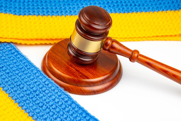 gavel of justice on the background of the Ukrainian flag