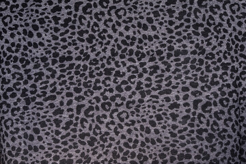 Leopard fabric print. Jaguar texture Background.