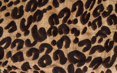 Leopard print pattern. Wild animal texture fabric background sample. Jaguar skin background.