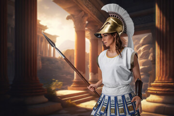 Portrait of warrior woman dressed in white tunic holding spear.