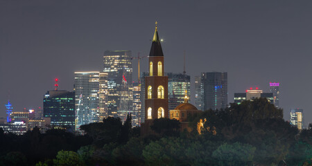 Tel Aviv: Russian Orthodox church and modern skyscrapers at night