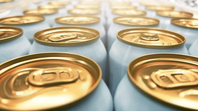 Tin cans with soda or beer stand in rows on the warehouse or supermarket shelf. Closeup shot