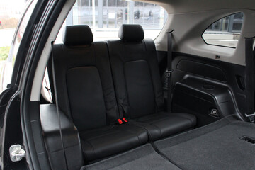 Interior of the seven-seater car. The second row of the rear seats.
