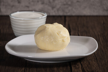 Home made butter from heavy whipping cream. Butter can be made using hand mixer or stand mixer or even with Jar beating cream on low to medium speed.
