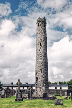 Celtic Christian round tower beside St. Brigid&rsquo;s Cathedral, Kildare, Ireland. Originally built in 6th C rebuilt in the 12th C. 108 feet tall