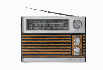 Authentic 70s radio receiver. Front view. Isolated on white background. Traces of time and scuffs...
