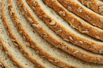 slice of whole grain bread on table 