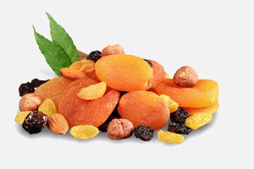 Dried tasty healthy fruits on background