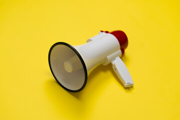 simple white megaphone speaker isolated, loudspeaker alert