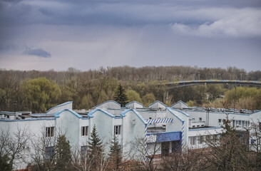 River station against the backdrop of a spring forest in cloudy weather, a station for ships in Chernihiv
