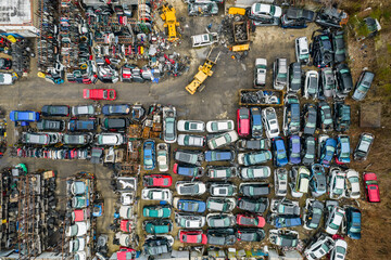 Cars in a junkyard from above