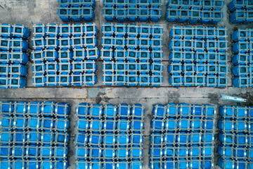 Blue industrial crates from an aerial view