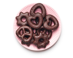 Sweet chocolate hearts, stars and pretzels isolated on white background.
