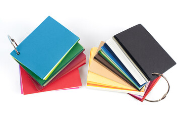 Catalogs of colored paper, cardboard, designer paper for choosing a basis for printing. Samples of paper in the polygraphic industry