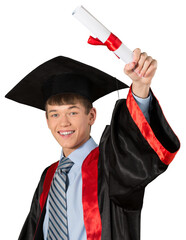 Teen male graduate holding up his diploma