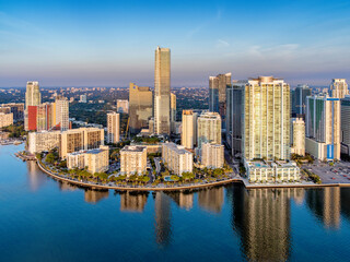 Fototapeta na wymiar Brickell Key,Downtown Miami and Four Seasons Hotel sunrise.Miami,South Florida,Dade,Florida,USA