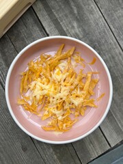 Melted cheese over tortilla strips.