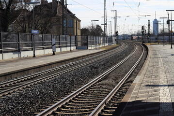 Obraz na płótnie Canvas railroad journey rails sleepers contrast line construction silhouette