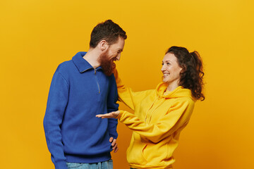 Man and woman couple smile and happiness, yellow background, family 