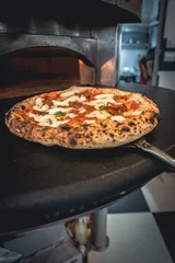 Crédence de cuisine en verre imprimé Naples Pizza napoletana in preparation by pizzaiolo