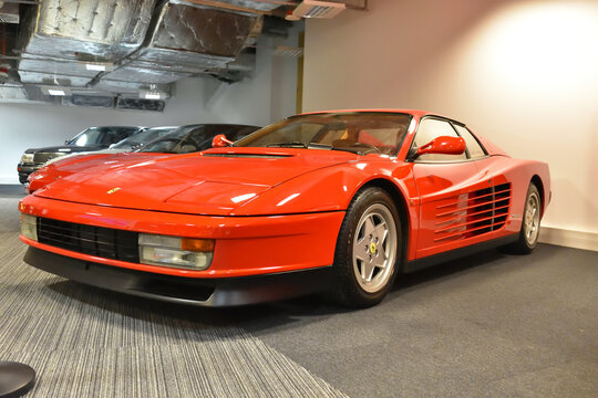 Ferrari Testarossa (1984), red classic sportscar on exposition, close up view. WARSAW, POLAND - JANUARY 14, 2023