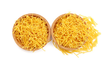 Plates of raw vermicelli pasta on white background