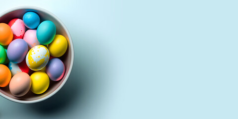 Bowl of colorfully decorated easter eggs on light blue  background, banner, panorama, copy space, generative ai