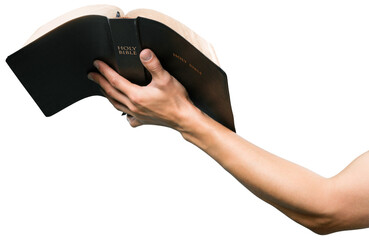 Human hand holding the saint book