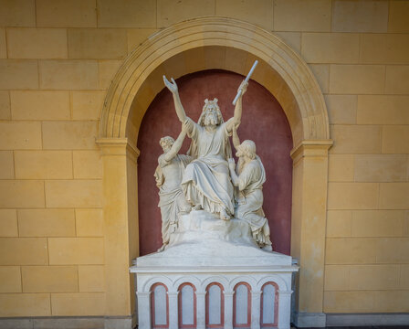 Moses in prayer supported by the high priests Aaron and Hur Sculpture at Church of Peace (Friedenskirche) - Potsdam, Brandenburg, Germany