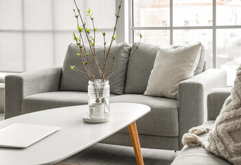 Grey sofa with cushion in modern living room