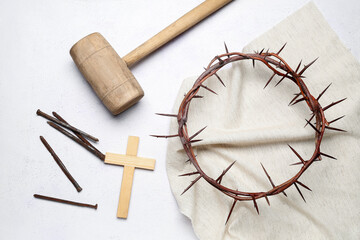 Crown of thorns with shroud, mallet, cross and nails on white background. Good Friday concept