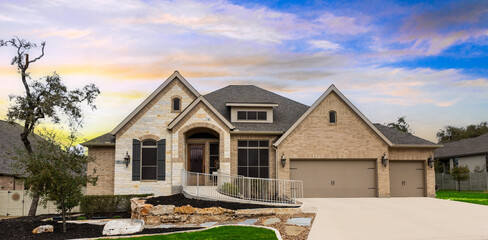 A stone home at sunset in texas
