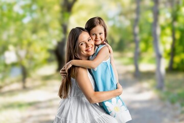 Fototapeta premium Young happy mother and child outdoors