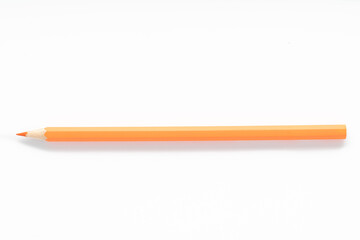 Closeup view of orange pencils on white background