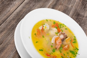 Delicious hot soup dish in plate