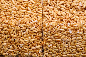Puffed rice bars (kozinaki) as background, top view
