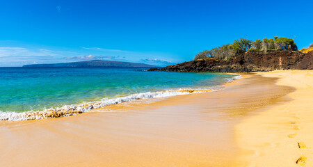 The Sand Covered Shore of Big Beach With Kaho' Olawe Island In The Distance, Makena Beach State Park, Maui, Hawaii, USA