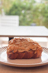 Freshly baked French croissant served in coffee shop