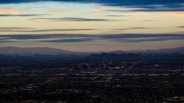 Time lapse of sunset over city lights in Phoenix, Arizona