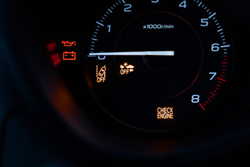 Vehicle Warning lights on a dashboard, check engine light, collision warning, safety features