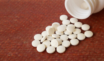 Close up of white pill.