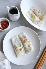 Homemade light snacks. Steamed Cheung Fan aka Rice Noodle Roll. Mixed rice flour with tapioca and glutinous flour with water and steam in flat rectangular pan with pan-fry dried shrimps
